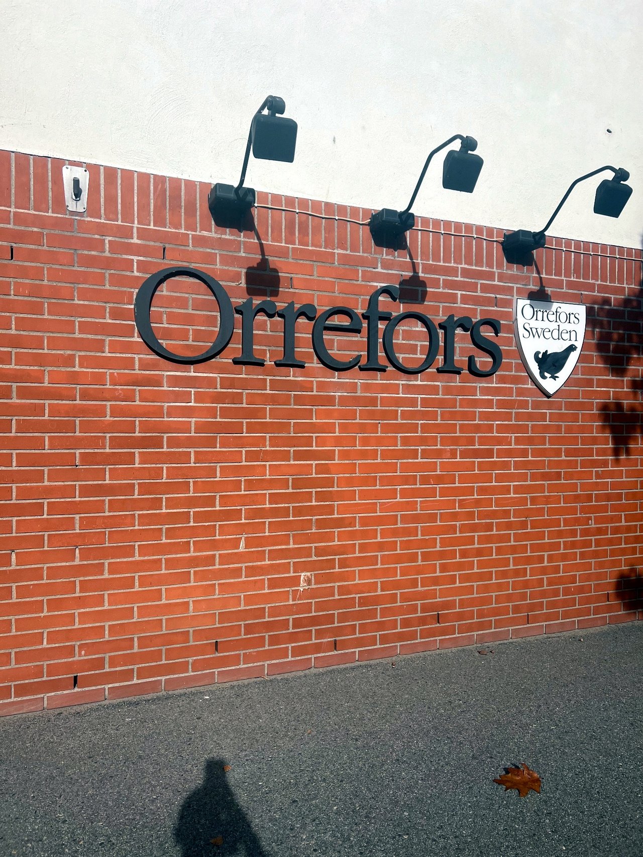 Orrefors sign on a brick wall